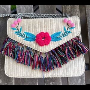 Great summer bag!!!Skinnydip Straw Crossbody bag! With Pom and Tassel detail!